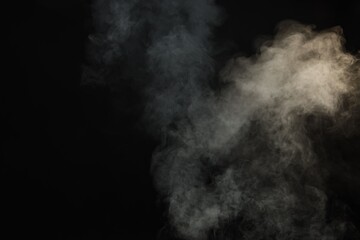 Fototapeta premium Beautiful smoke in light on dark background