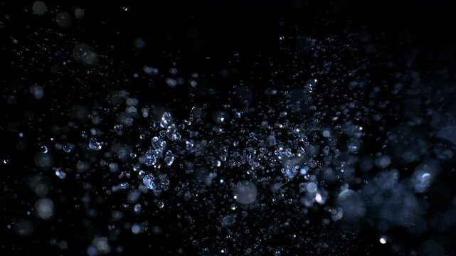 Super Slow Motion Shot of Water Drop Explosion Towards Camera at 1000fps. Cinematic Background.