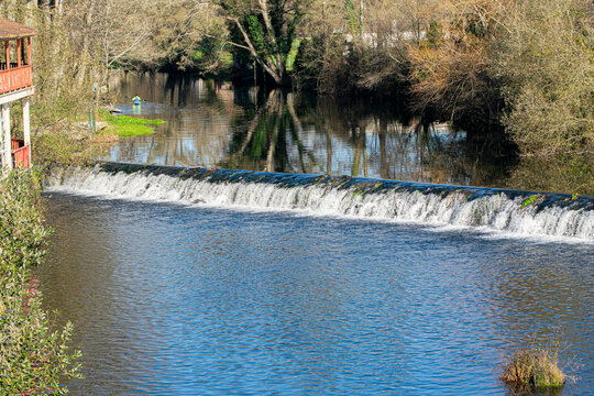 Allariz Arnoia river with a small waterfall The Concept of nature and travel
