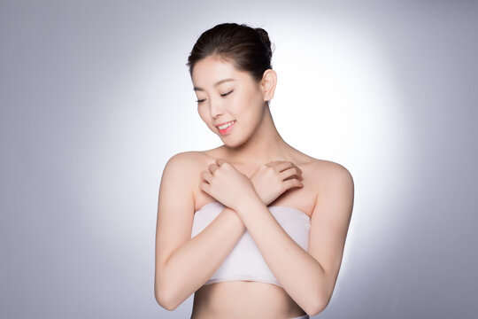 Young woman beauty portrait with smooth skin and gentle self care pose