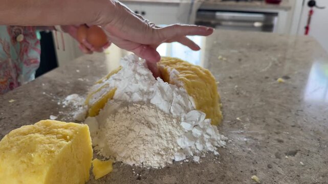 Adding Egg to Potato Dough for Homemade Dumplings
