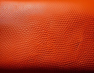 Obraz premium orange pebbled leather surface texture background with background material synthetic close up abstract backdrop minimalist geometric repetitive structured industrial textural artistic