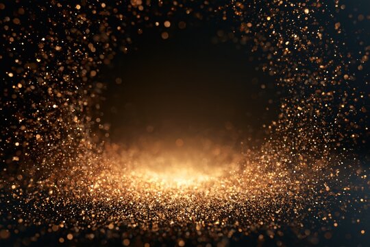 Golden confetti and sparkling particles burst over a black background with a bright glowing center and empty copy area for celebration designs.