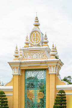 Ornate golden Buddhist stupa with traditional details