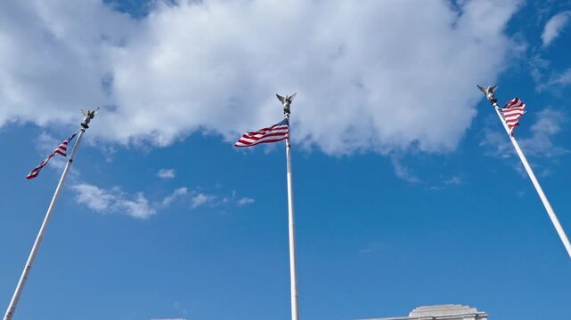 American flag waving in the wind. Flag of the USA. National waving flag of united states, patriotism. Independence day. Patriotic symbol. American flag in Washington DC. 4th of July