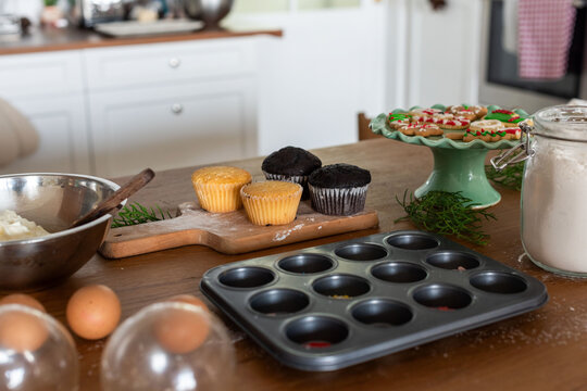 Baking essentials on wooden table.