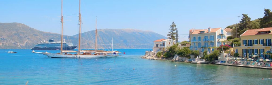 Cinematic View of Fiskardo Harbor in Kefalonia, Greece
