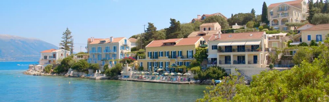 Cinematic View of Fiskardo Harbor in Kefalonia, Greece
