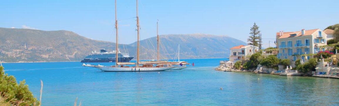Cinematic View of Fiskardo Harbor in Kefalonia, Greece
