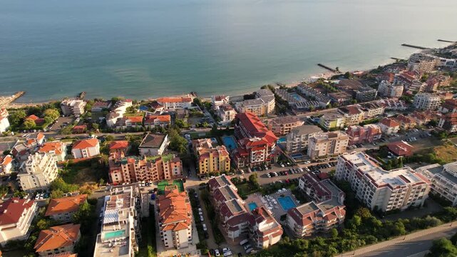 Panoramic aerial view of houses and hotels, sea and beaches of Sveti Vlas in Bulgaria from above, top view from drone. Summer holiday in Europe. 
