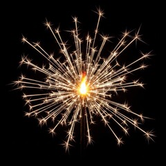 Obraz premium A single handheld sparkler burning with a bright glowing core and radiating yellow starburst sparks isolated on a solid black background for high contrast.