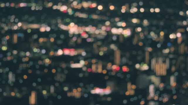 Blurred night city lights background viewed from a mountain summit in Takamatsu, Kagawa, Japan