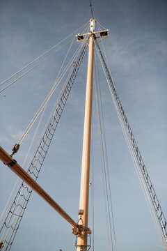 Tall sailboat mast without sails