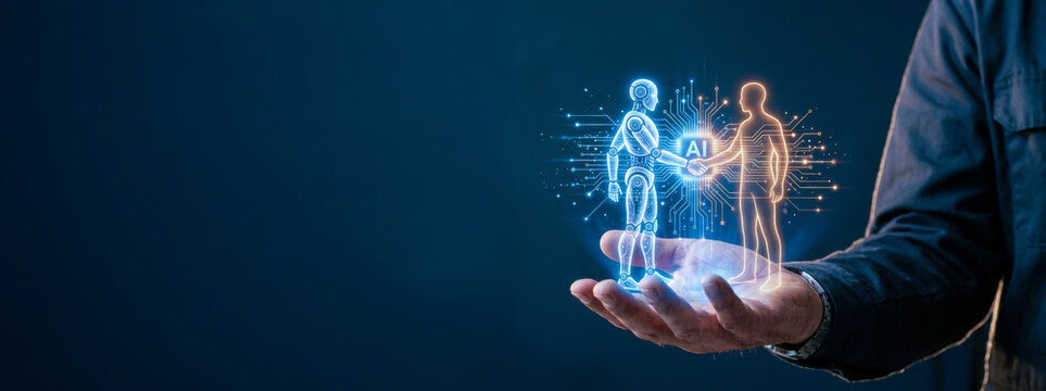 Businessman hand holding a glowing hologram of a human and robot shaking hands representing artificial intelligence collaboration, future machine partnership, and digital tech innovation.