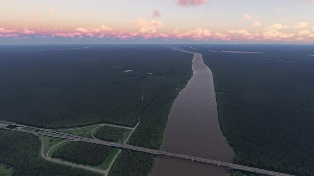 Circular aerial drone view at sunset of Atchafalaya Basin in Louisiana. United States