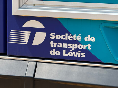L&eacute;vis, Qu&eacute;bec, Canada. August 21, 2026. Close up of Soci&eacute;t&eacute; de transport de L&eacute;vis logo printed on public transit bus side panel.