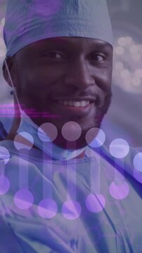 Animation of data processing and dna strand over diverse surgeons wearing face masks