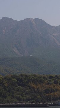 Sakurajima Volcano Island landscape, Japan, Kagoshima prefecture, Kyushu island region, island volcano and bay, Yunohira Observation Deck, ferry trip from Kagoshima, Kirishima-Kinkowan National Park 