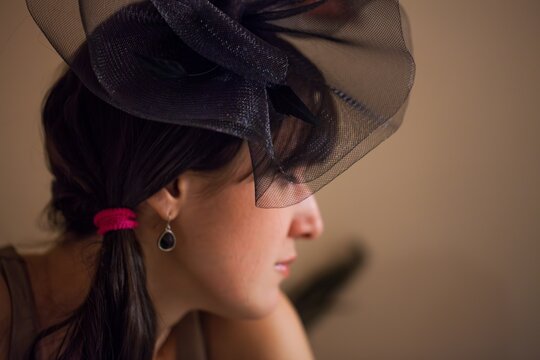 Woman Wearing Decorative Fascinator Headpiece