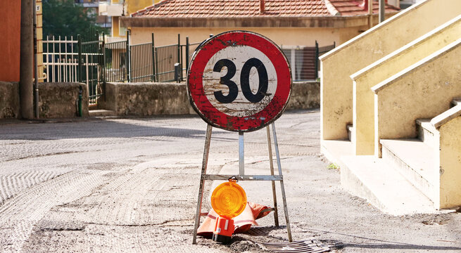 Road signs for roadworks with a 30 km/h speed limit
