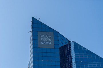 Fototapeta premium Toronto, ON, Canada - August 21, 2026: Nestle Canada Building on Sheppard Avenue West in North York, Toronto, Canada. Nestle S A is the world's largest publicly held food and drink processing conglom
