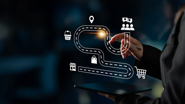 A seamless blend of technology and strategy, this image captures a person hand interacting with a digital map, symbolizing business journey, planning, and innovation in a dark setting. Ledger