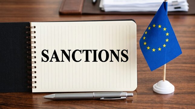 EU Sanctions and International Policy Concept with European Union Flag, Notepad, and Pen on Office Desk