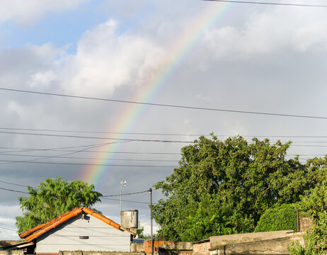 Rainbow Over a Residential Neighborhood After Rain
