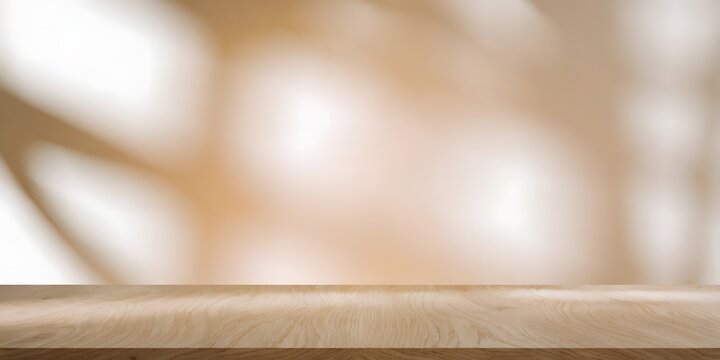 Empty wooden table with blurred bokeh.