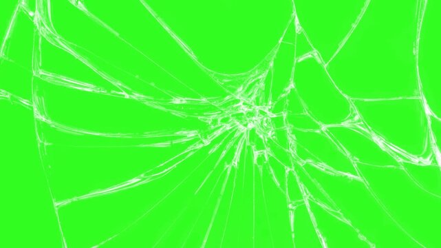 Glass breaking into pieces. Realistic Glass impact crack, glass broken splash, with chroma key green screen as background, Shattered and broken glass shards cracked screen effect 