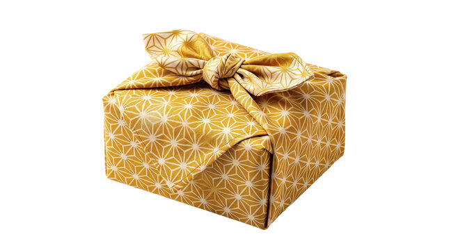 Traditional furoshiki gift wrap box tied with yellow geometric pattern fabric ribbon