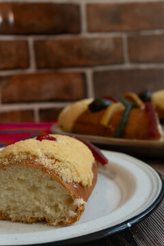 Slice of "Rosca de Reyes" or Epiphany bread, Mexican tradition on January 6