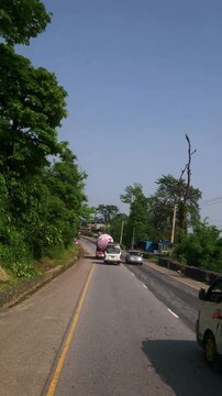 Vertical Driving POV Through Lush Green Himalayan Hills with Cars and Motorcycles, Scenic Road Trip, Mountain Travel