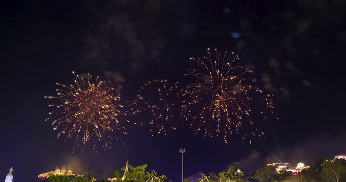 Spectacular golden fireworks display exploding in the night sky during Phra Nakhon Khiri annual festival in Phetchaburi Thailand.