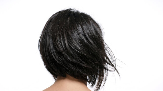 Back view of a woman with short black hair isolated on white background