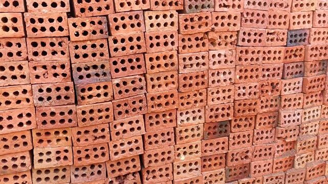 Stack Of Red Clay Clay Bricks For Building Construction Material