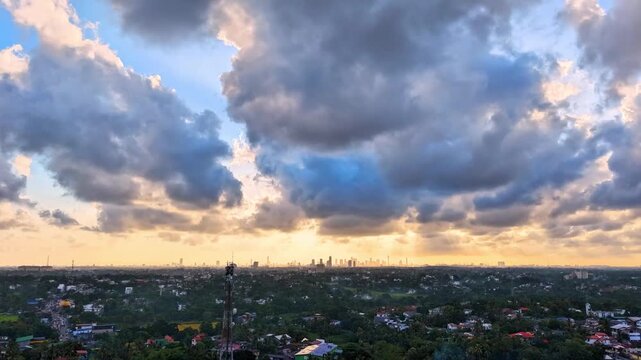 Aerial view of Colombo cityscape timelapse with dramatic clouds and sun rays at sunset 