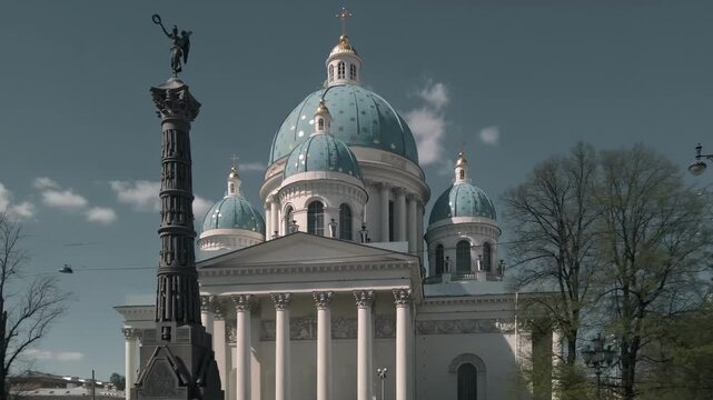 Iconic St. Petersburg landmark with blue domes and a monument under a cloudy sky