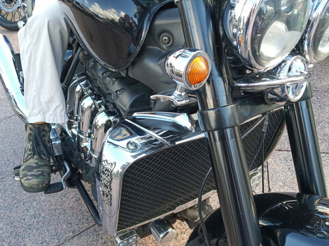 Grodno, Republic of Belarus. - September 09, 2018: A close-up of the engine of the legendary Triumph Rocket III cruiser motorcycle, known for its massive three-cylinder engine.