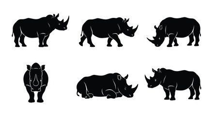 Rhino silhouettes in various poses against a white background © nurjahan