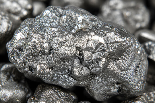 Natural Platinum Nugget Macro Texture with Raw Precious Metal Surface
