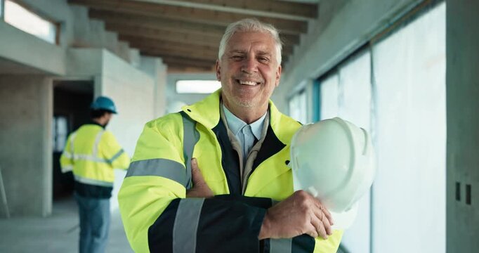 Construction, face and man on site with arms crossed, contractor and pride in industrial development. Happy, confidence and mature engineer with ppe hardhat, handyman or ambition in building project