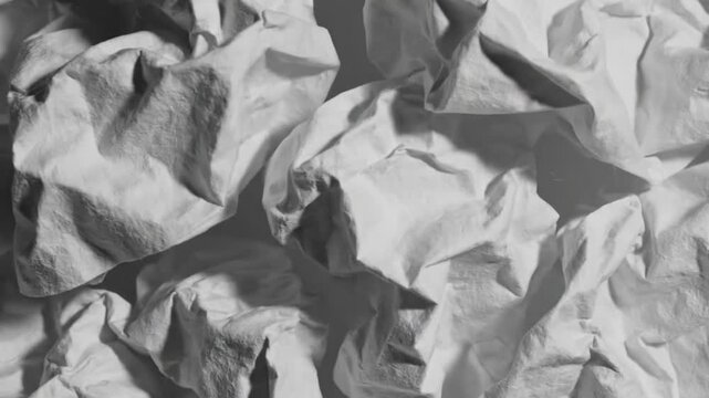 Crumpled white paper texture macro background moving dynamic footage.