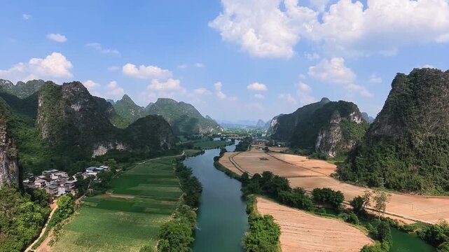 Drone view karst landscape of blackwater river mountains in Mingshi pastoral area (Mingshi tianyuan countryside), Chongzuo, Baise, Guangxi, China. 4k time lapse footage travel concept high angle view.