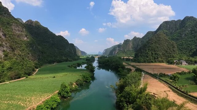 Drone view karst landscape of blackwater river mountains in Mingshi pastoral area (Mingshi tianyuan countryside), Chongzuo, Baise, Guangxi, China. 4k time lapse footage travel concept high angle view.