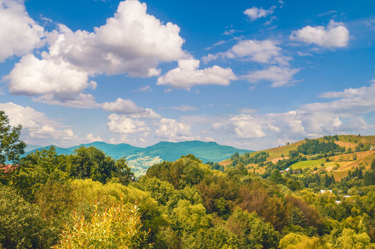 View of the slopes of mountains during sunset in summer