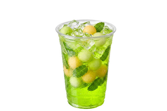 Refreshing iced green melon mint drink in a plastic cup