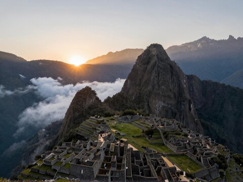Aerial Sunrise Sea Of Clouds Surrounding Machu Picchu Peru