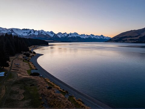 Aerial Sunset Glow Over Lake Tekapo Winter South Island NZ