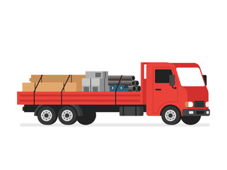 Fototapeta premium Red flatbed truck transporting building materials and timber on white background